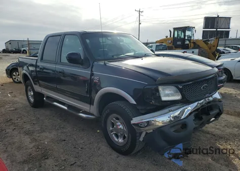 2001 Ford F150 Supercrew z USA, uszkodzony, nr VIN 1FTRW08L71KA77829